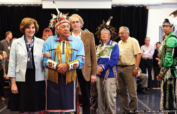 Judith Woodsworth accompanies Kahnawake elder Alex Sonny Diabo and members of the Keepers of the Eastern Door dance troupe in performing The Unity Stomp, a traditional dance, to celebrate the signing of the Accord on Indigenous Education.  The landmark accord was signed by First Nations chiefs and members of the Association of Canadian Deans of Education during Congress 2010. It provides for a new framework under which university programs will be reviewed to better reflect the values of Indigenous people.
